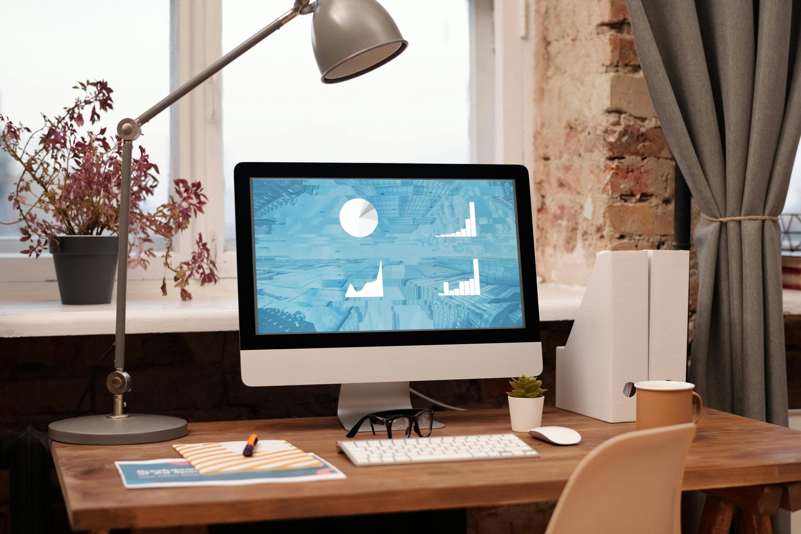 A computer screen on a desk, representing a virtual office setup for remote work and productivity.