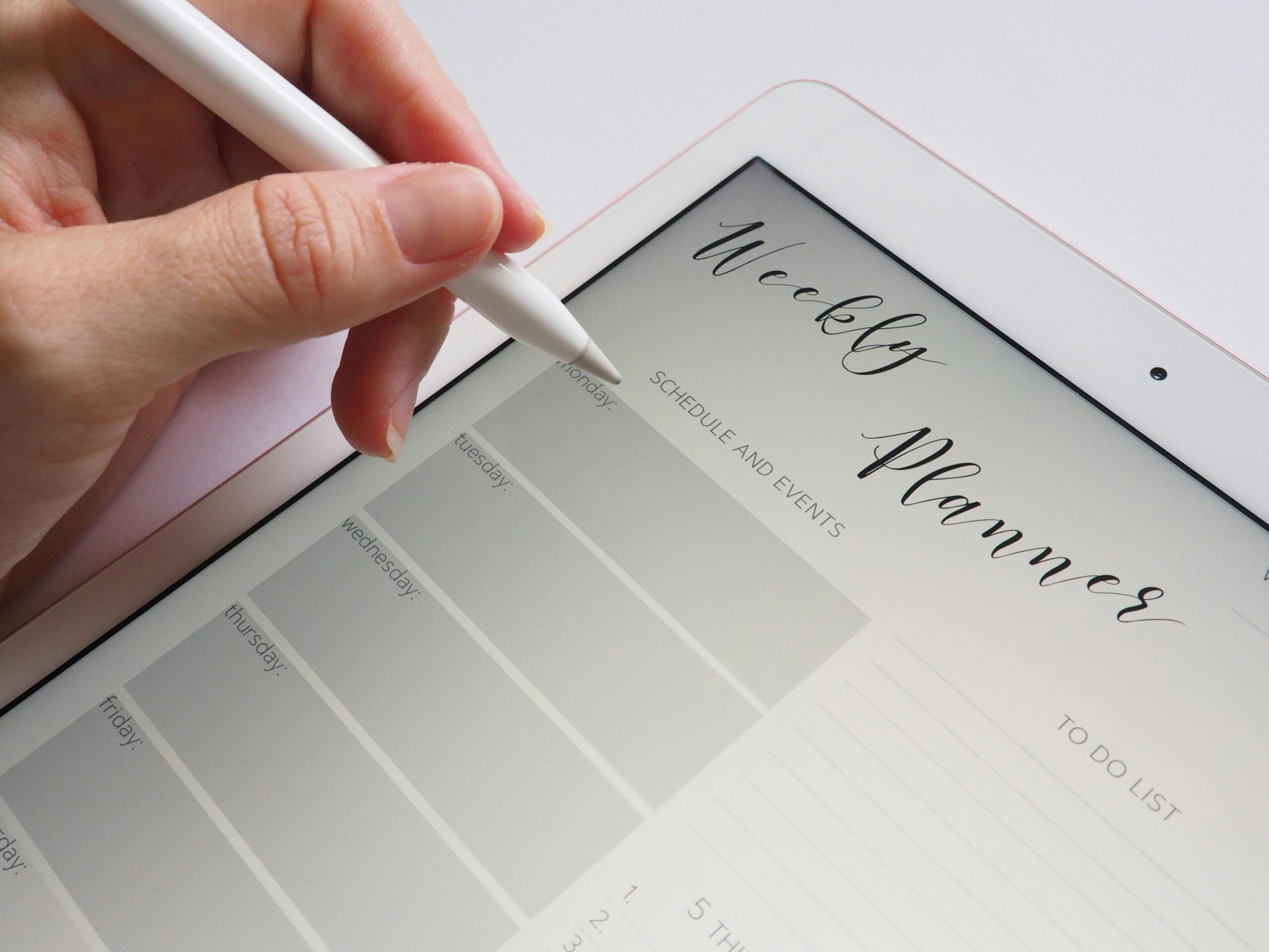 Weekly planners for iPad showcasing call answering services for efficient organization and time management.